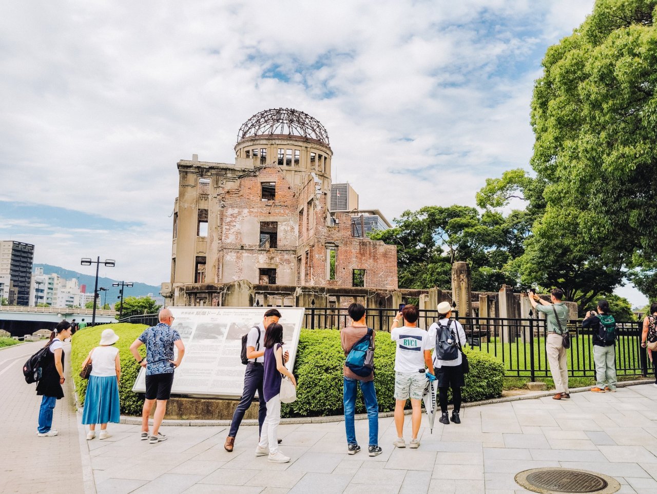 Group of young travellers visiting the Hiroshima Peace Memorial